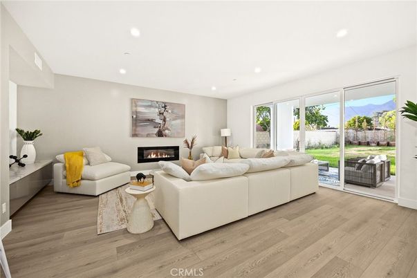Fireplace, Interior, Living room, Recessed Lighting, Wood Texture Flooring