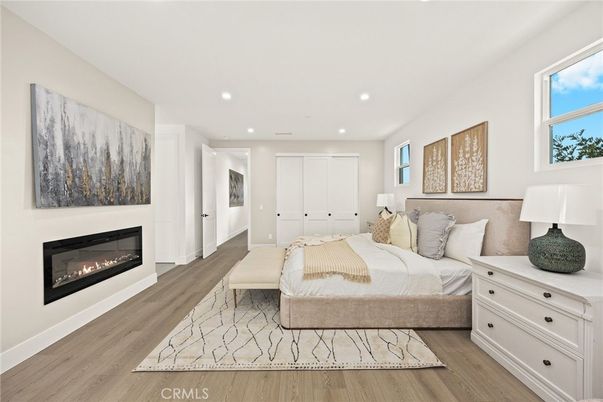 Bedroom, Fireplace, Interior, Recessed Lighting, Wood Texture Flooring