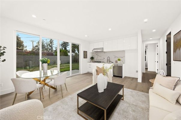 Dining room, Interior, Kitchen, Living room, Marble Walls, Recessed Lighting, Wood Texture Flooring