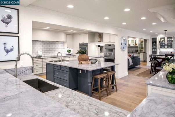 Dining room, Interior, Kitchen, Pendant Lights, Recessed Lighting, Stainless Steel Appliances, Wood Texture Flooring