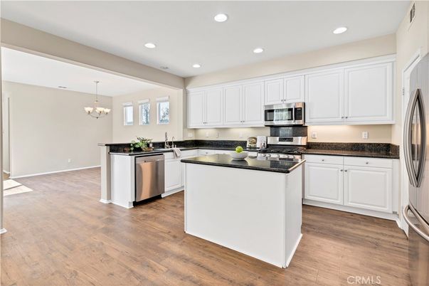 Chandelier, Interior, Kitchen, Recessed Lighting, Stainless Steel Appliances, Wood Texture Flooring
