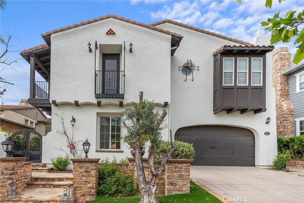 Attached, Exterior, Facade, Spanish Mediterranean