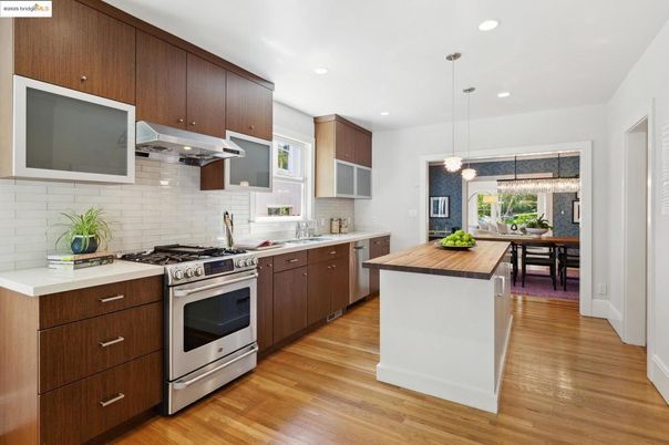 Dining room, Interior, Kitchen, Pendant Lights, Recessed Lighting, Stainless Steel Appliances, Wood Texture Flooring