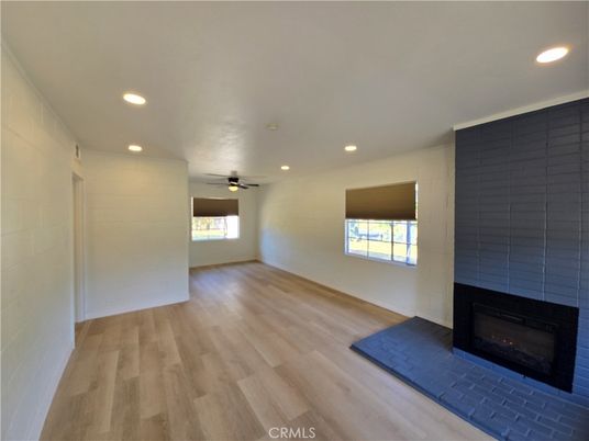Empty room, Fireplace, Interior, Recessed Lighting, Wood Texture Flooring