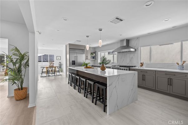 Dining room, Interior, Kitchen, Marble Walls, Pendant Lights, Recessed Lighting, Stainless Steel Appliances