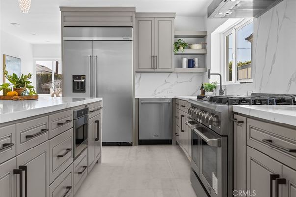 Interior, Kitchen, Marble Walls, Recessed Lighting, Stainless Steel Appliances