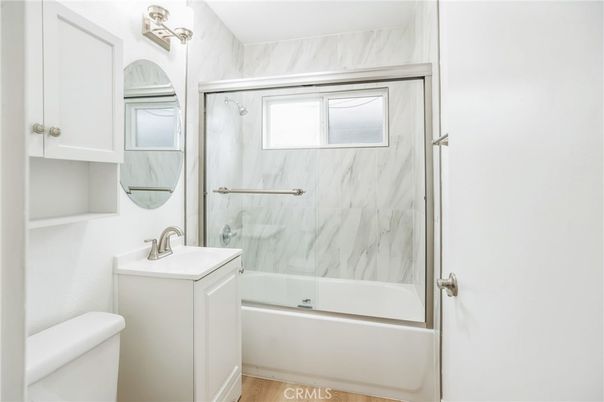 Bathroom, Glass Shower, Interior, Marble Walls, Wood Texture Flooring