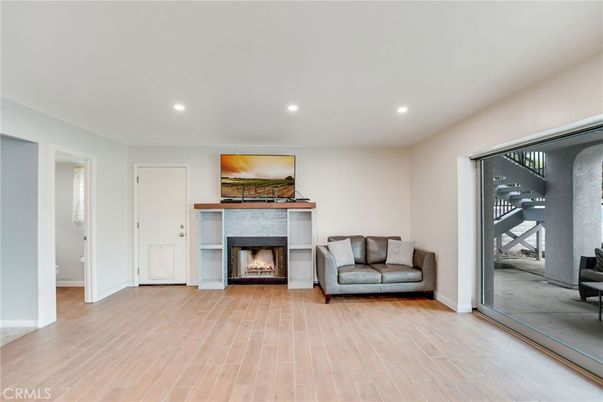 Fireplace, Interior, Recessed Lighting, Wood Texture Flooring