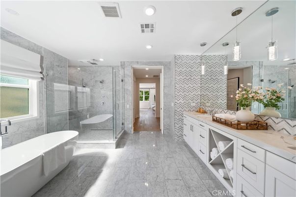 Bathroom, Dual Sink Vanities, Free Standing Baths, Glass Shower, Interior, Marble, Marble Walls, Pendant Lights, Recessed Lighting