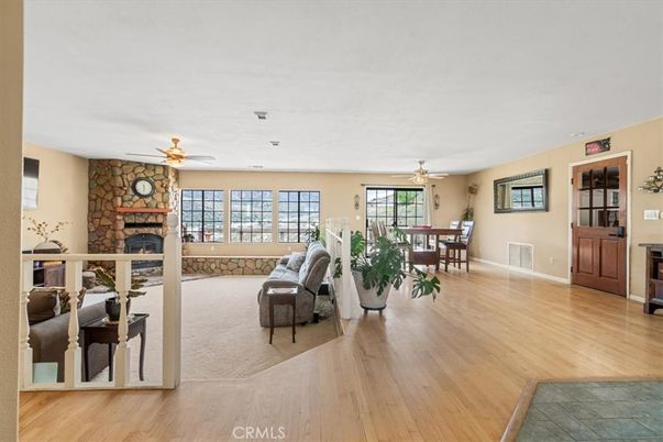 Dining room, Fireplace, Interior, Living room, Stone Walls, Wood Texture Flooring