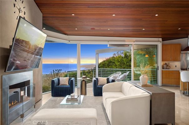 Fireplace, Interior, Living room, Recessed Lighting, Water, Wooden Ceilings