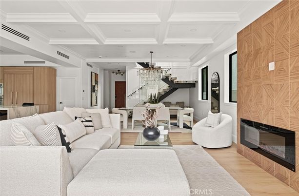 Chandelier, Dining room, Fireplace, Interior, Living room, Recessed Lighting, Wood Texture Flooring