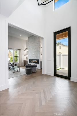 Fireplace, Interior, Living room, Recessed Lighting, Stone Walls, Wood Texture Flooring