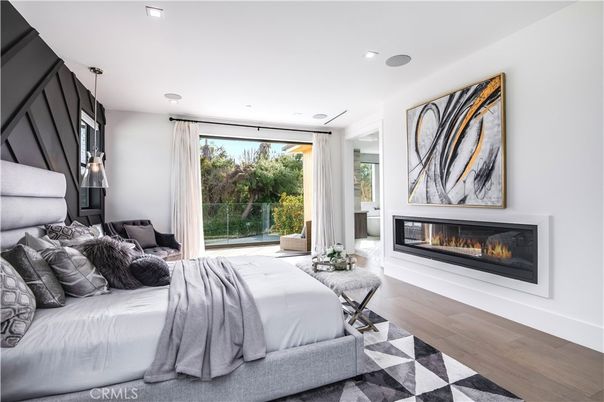 Bedroom, Fireplace, Interior, Pendant Lights, Recessed Lighting, Wood Texture Flooring