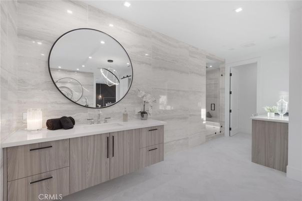 Bathroom, Dual Sink Vanities, Glass Shower, Interior, Marble Walls, Recessed Lighting