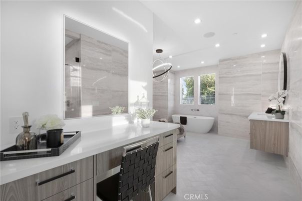 Bathroom, Dual Sink Vanities, Free Standing Baths, Glass Shower, Interior, Marble Walls, Pendant Lights, Recessed Lighting