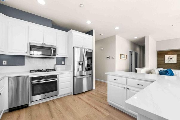 Interior, Kitchen, Recessed Lighting, Stainless Steel Appliances, Wood Texture Flooring