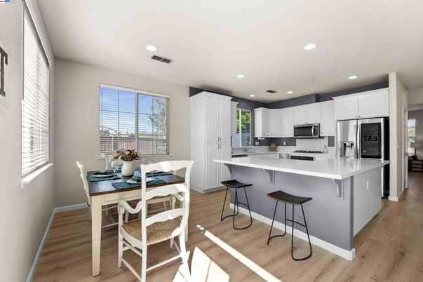 Dining room, Interior, Kitchen, Recessed Lighting, Stainless Steel Appliances, Wood Texture Flooring