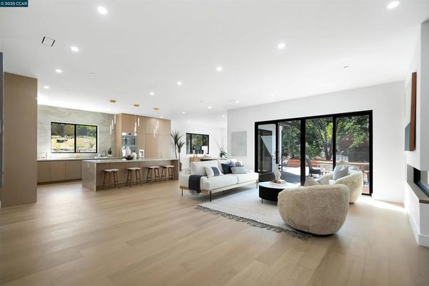 Fireplace, Interior, Kitchen, Living room, Recessed Lighting, Stainless Steel Appliances, Wood Texture Flooring