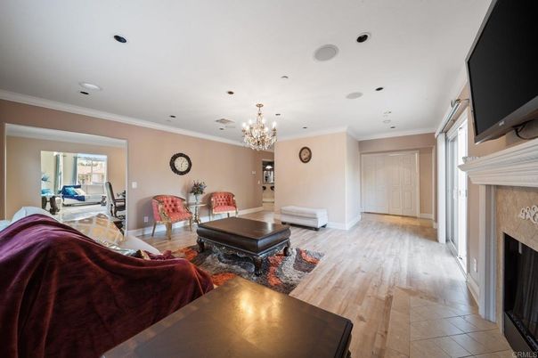 Chandelier, Fireplace, Interior, Living room, Recessed Lighting, Wood Texture Flooring