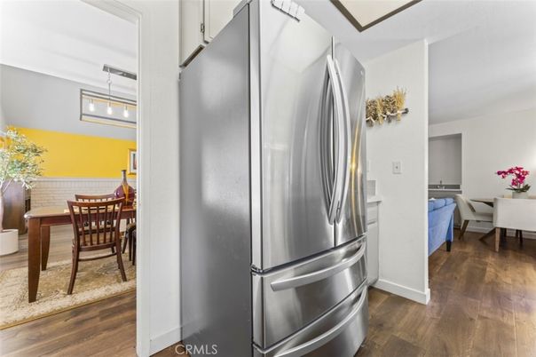 Dining room, Interior, Kitchen, Pendant Lights, Stainless Steel Appliances, Wood Texture Flooring