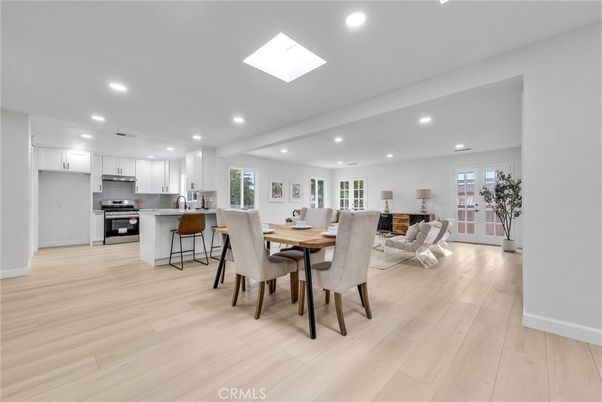 Dining room, Interior, Kitchen, Living room, Recessed Lighting, Stainless Steel Appliances, Wood Texture Flooring