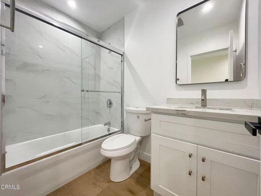 Bathroom, Glass Shower, Interior, Marble Walls, Recessed Lighting, Wood Texture Flooring