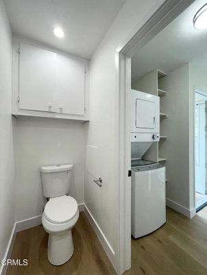Bathroom, Interior, Recessed Lighting, Utility Closets, Washer, Wood Texture Flooring