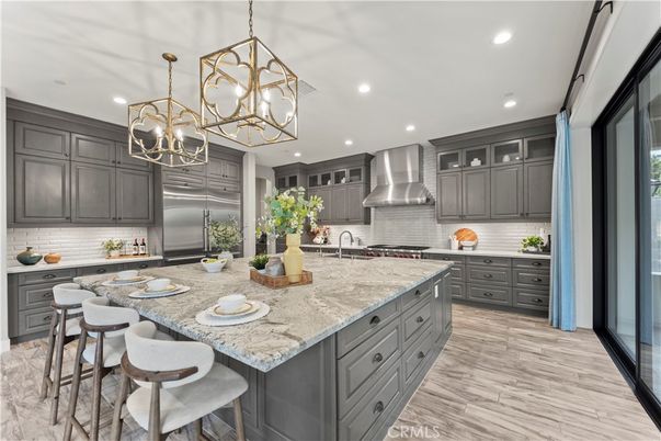 Chandelier, Interior, Kitchen, Pendant Lights, Recessed Lighting, Stainless Steel Appliances, Wood Texture Flooring