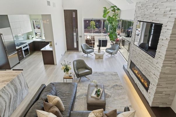 Fireplace, Interior, Kitchen, Living room, Stainless Steel Appliances, Stone Walls, Wood Texture Flooring