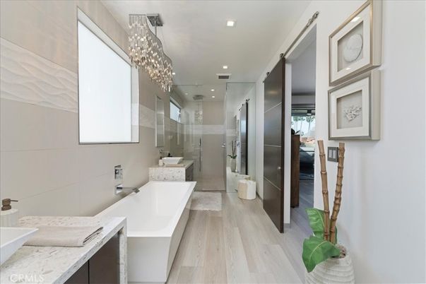 Bathroom, Free Standing Baths, Glass Shower, Interior, Pendant Lights, Recessed Lighting, Wood Texture Flooring