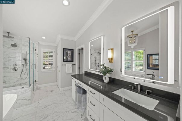 Bathroom, Dual Sink Vanities, Glass Shower, Interior, Marble, Marble Walls, Recessed Lighting