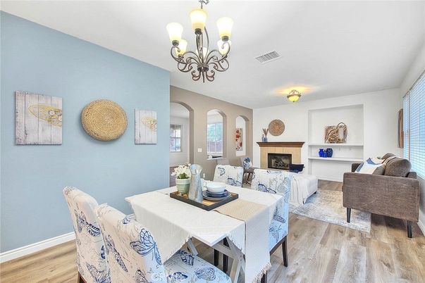 Chandelier, Dining room, Fireplace, Interior, Living room, Piano, Wood Texture Flooring
