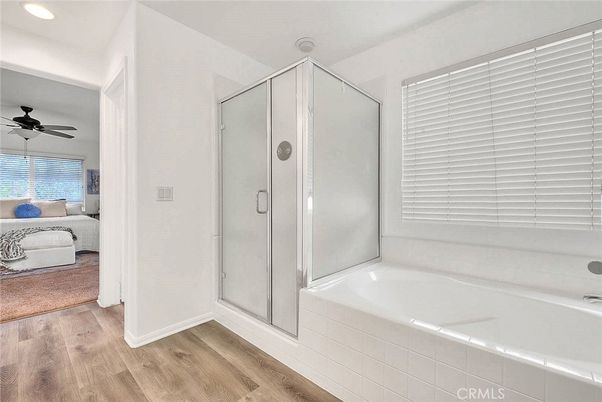 Bathroom, Bedroom, Glass Shower, Interior, Recessed Lighting, Wood Texture Flooring