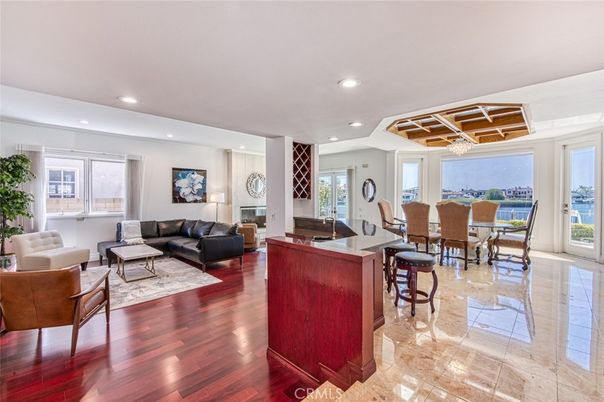Dining room, Fireplace, Interior, Living room, Recessed Lighting, Wood Texture Flooring