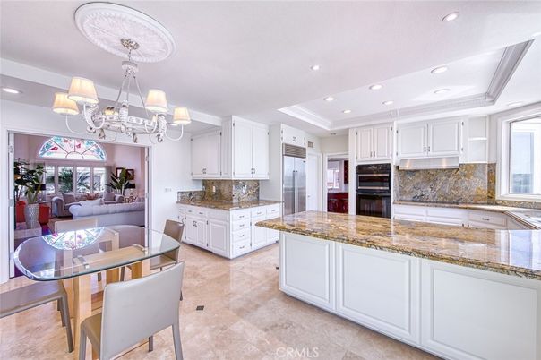 Chandelier, Dining room, Interior, Kitchen, Living room, Recessed Lighting, Stainless Steel Appliances