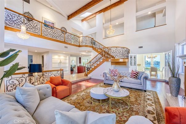 Chandelier, Dining room, Interior, Living room, Pendant Lights, Recessed Lighting, Wooden Beams, Wood Texture Flooring