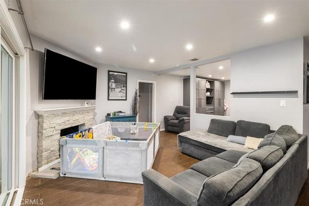 Fireplace, Interior, Living room, Recessed Lighting, Wood Texture Flooring