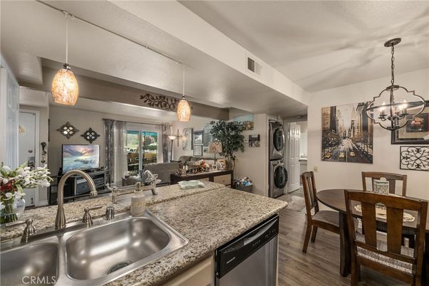 Dining room, Interior, Kitchen, Living room, Pendant Lights, Washer, Wood Texture Flooring