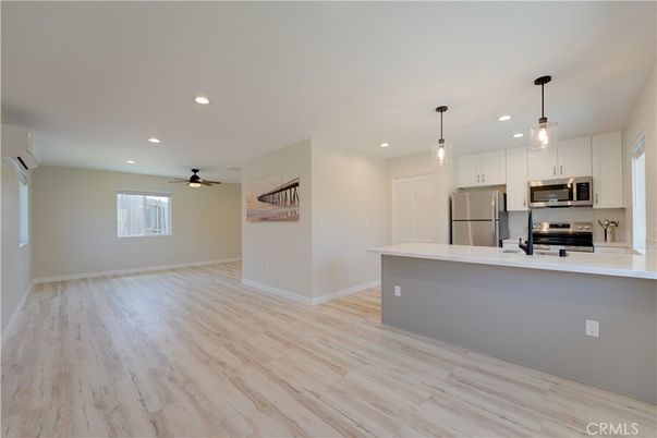 Interior, Kitchen, Pendant Lights, Recessed Lighting, Stainless Steel Appliances, Wood Texture Flooring