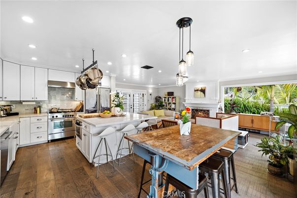 Fireplace, Interior, Kitchen, Pendant Lights, Recessed Lighting, Stainless Steel Appliances, Wood Texture Flooring