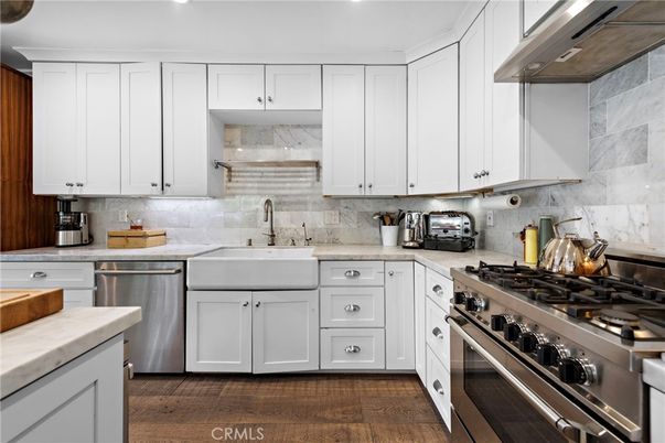 Interior, Kitchen, Marble Walls, Stainless Steel Appliances, Wood Texture Flooring