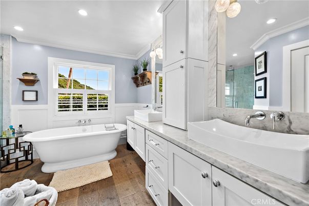 Bathroom, Dual Sink Vanities, Free Standing Baths, Glass Shower, Interior, Recessed Lighting, Wood Texture Flooring