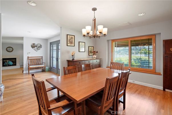 Chandelier, Dining room, Fireplace, Interior, Recessed Lighting, Wood Texture Flooring