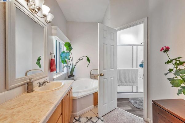 Bathroom, Dual Sink Vanities, Interior, Tile Countertops, Wood Texture Flooring