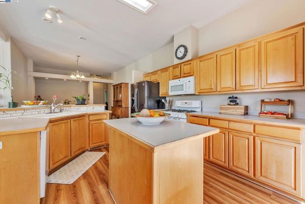 Chandelier, Interior, Kitchen, Recessed Lighting, Tile Countertops, Wood Texture Flooring