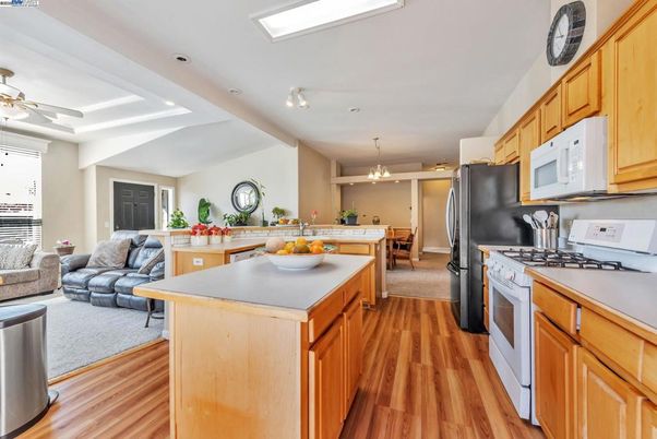Chandelier, Dining room, Interior, Kitchen, Living room, Recessed Lighting, Wood Texture Flooring