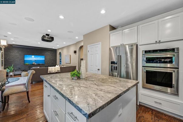 Dining room, Interior, Kitchen, Recessed Lighting, Stainless Steel Appliances, Wood Texture Flooring