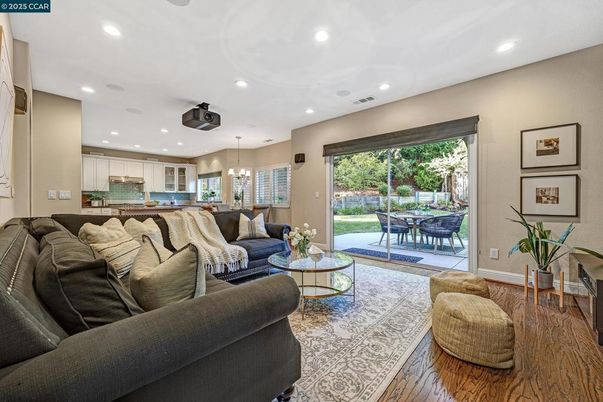 Chandelier, Dining room, Interior, Kitchen, Living room, Pendant Lights, Recessed Lighting, Wood Texture Flooring