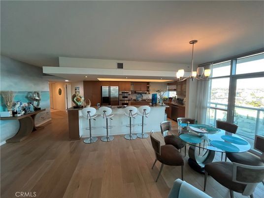 Dining room, Interior, Kitchen, Pendant Lights, Recessed Lighting, Stainless Steel Appliances, Wood Texture Flooring